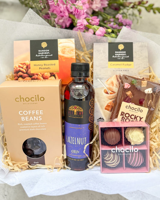 Sweetest Gesture Gift Hamper is a sweet treat hamper featuring an assortment of  sweet snacks and chocolates.